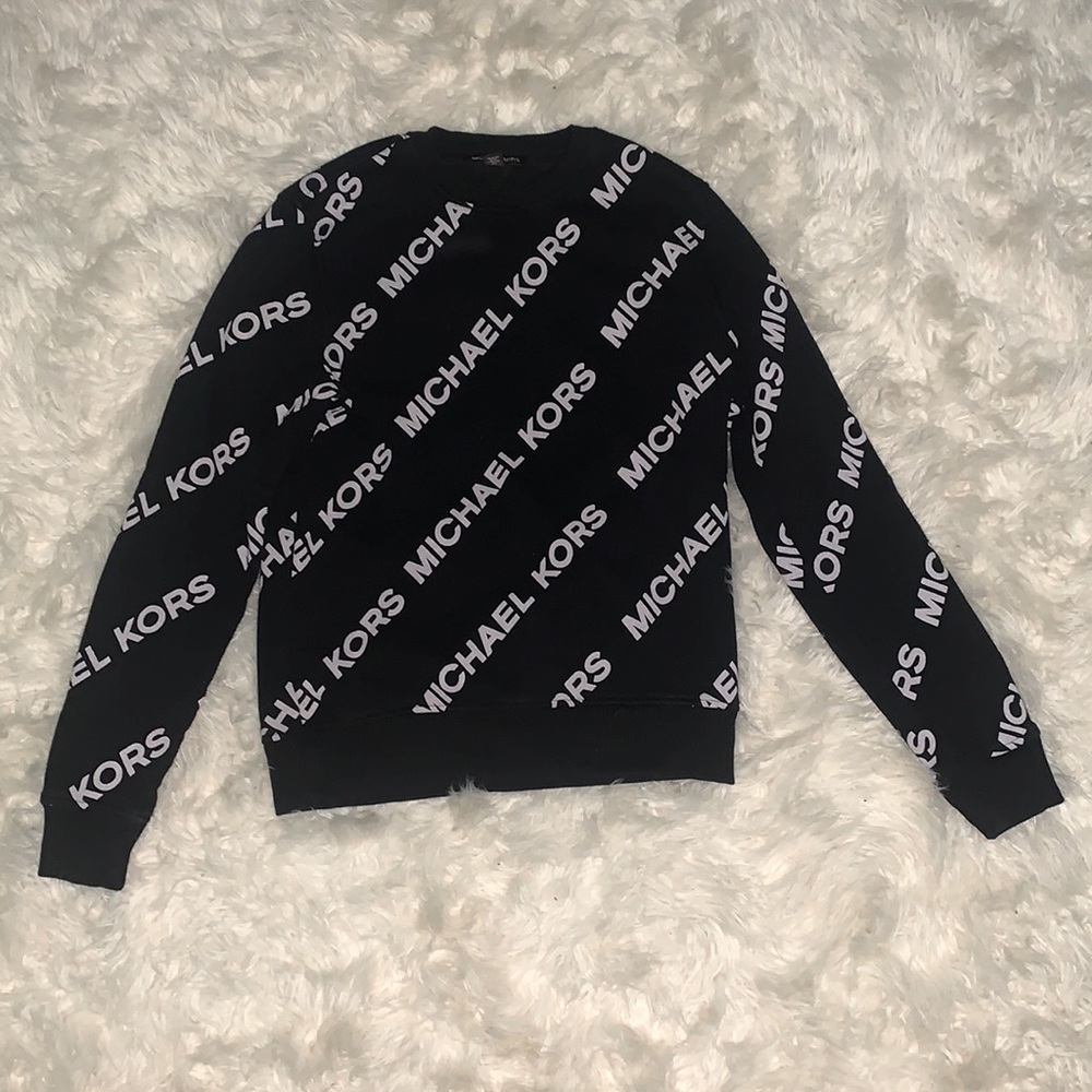 black Micheal kors sweater with print all around. Size small (IT IS USED)